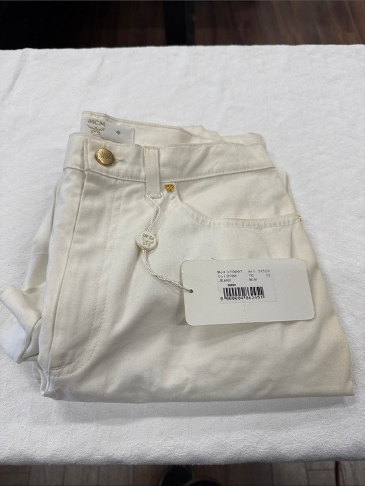 MCM Cream High-Rise Jeans with Gold Accents