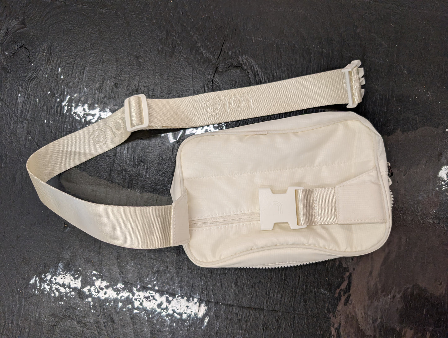 Lolë white belt bag with adjustable strap
