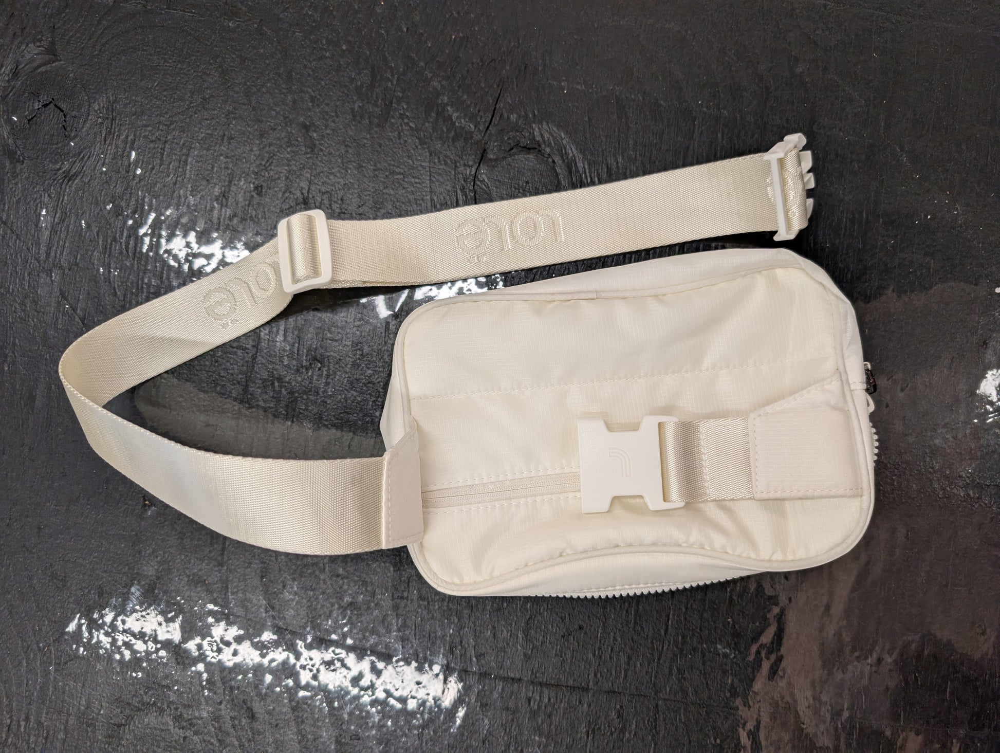 Lolë white belt bag with adjustable strap