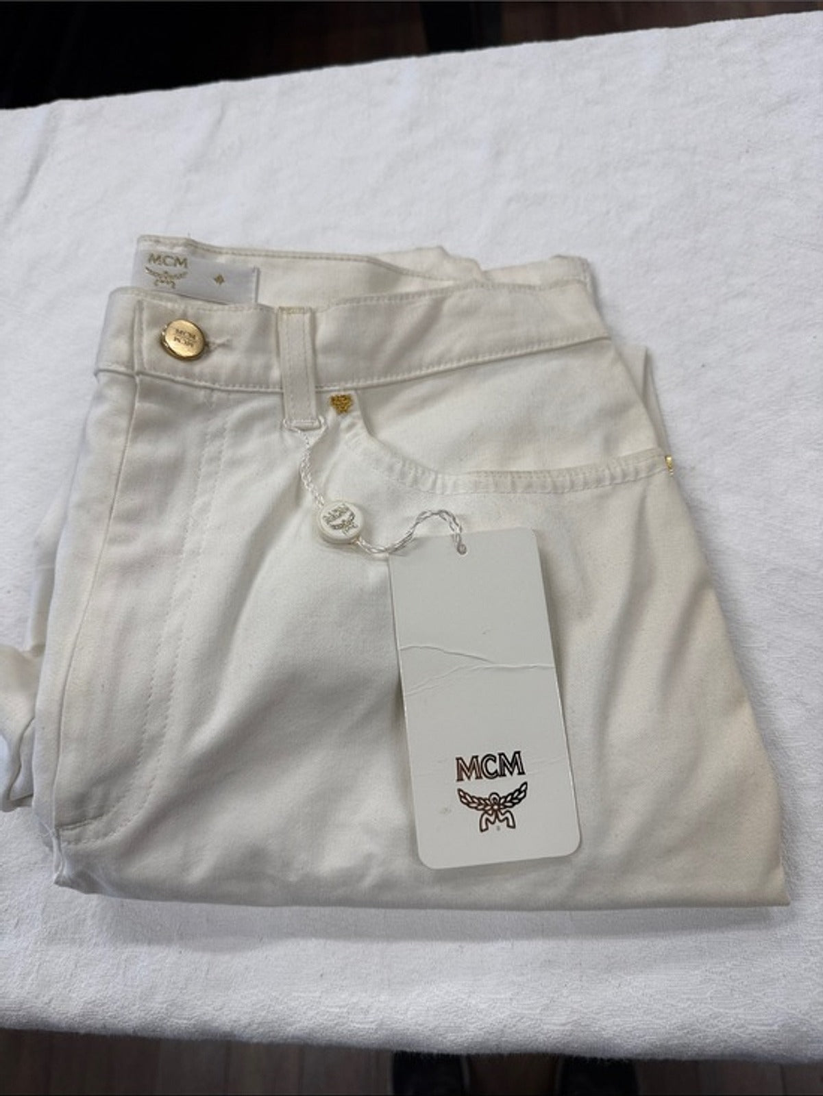 MCM Cream High-Rise Jeans with Gold Accents